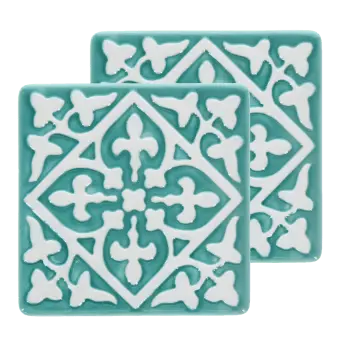 Set of two turquoise ceramic coaster with embossed pattern.