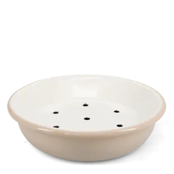 Round two-part soap dish with drainage holes.