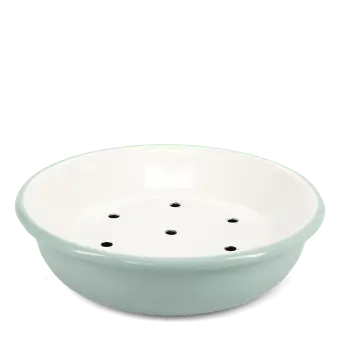 Round two-part soap dish with drainage holes in sage green.