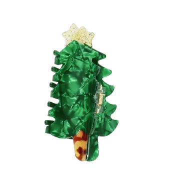 Green Christmas tree-shaped hair claw clip with a glittery gold star topper.