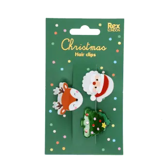 Set of three Christmas hair clips featuring a Santa, reindeer and Christmas tree design on retail packaging.