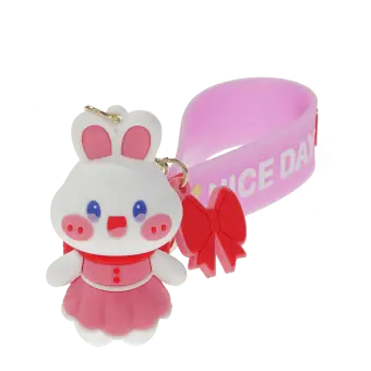 Bunny bag charm with pink outfit, silicone wrist strap and bow detail