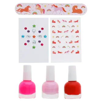 Unicorn nail kit contents including three nail polishes, a unicorn nail file, and unicorn-themed nail stickers.
