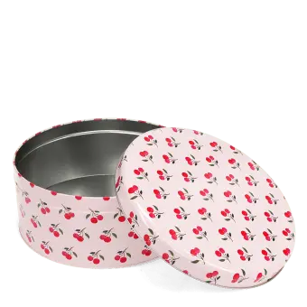Round cake tin with open lid featuring a red cherry pattern