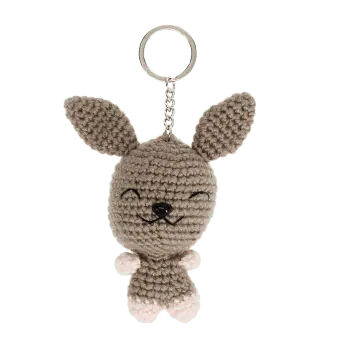 Crochet rabbit keyring with long ears and a silver metal keyring attachment.