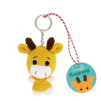 Crochet giraffe keyring with small horns and a silver metal keyring attachment with tag.
