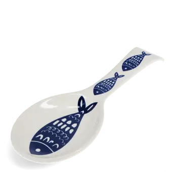White ceramic spoon rest with blue fish design.