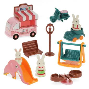 Ice Cream Playground playset with toy ice cream van, slide, swing and bunny figures.