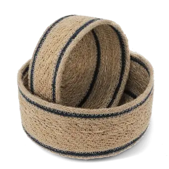 Set of two round woven storage baskets with black stripe detail.