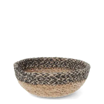 Round seagrass bowl with natural and black woven detail.