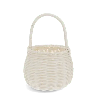 Natural wicker basket in white with twisted handle for storage