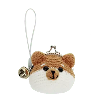 Crochet fox-shaped coin purse with a metal clasp and hanging bell charm.