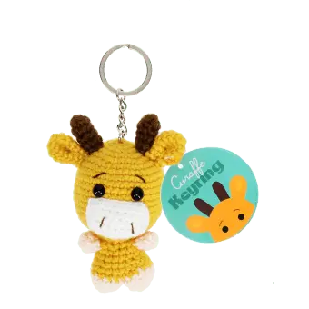 Crochet giraffe keyring with small horns and a silver metal keyring attachment with tag.