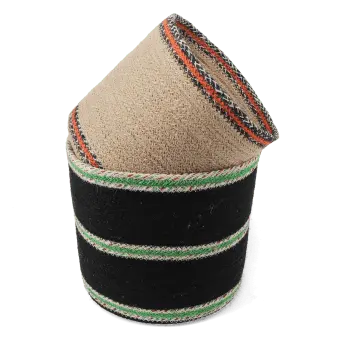 Set of two round jute storage baskets in natural and black.