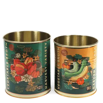 Set of two vegetable broth storage tins with colourful harvest vegetable illustrations