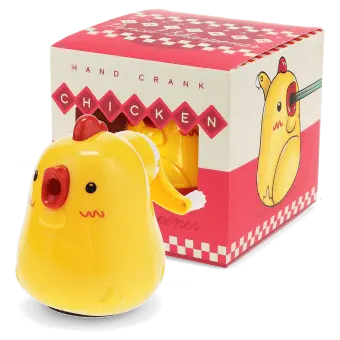 Hand-crank chicken pencil sharpener with yellow plastic body and retail packaging.