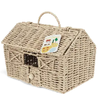 Woven farmhouse-shaped basket with pitched roof, handle, window and tag.