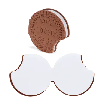 Chocolate biscuit-shaped notebook shown closed and open, revealing bite-shaped white pages.