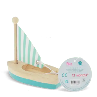 Good catch. From the image alone, the sail appears to be a flat printed panel and not clearly fabric. For accurate alt text, I'd avoid specifying the material.  Little wooden sailing boat with turquoise hull and striped sail with tag