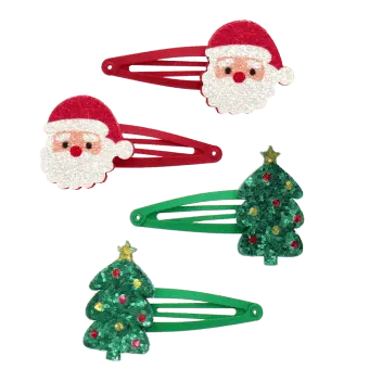 Set of four Christmas hair clips featuring Santa faces and glitter Christmas trees