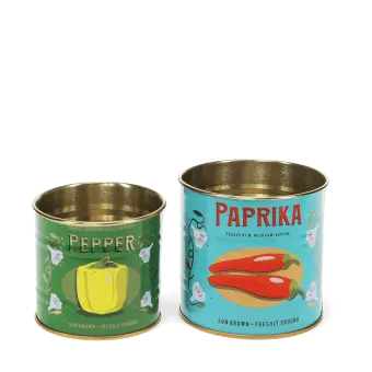Decorative storage tins labelled "Pepper" and "Paprika" with illustrated peppers