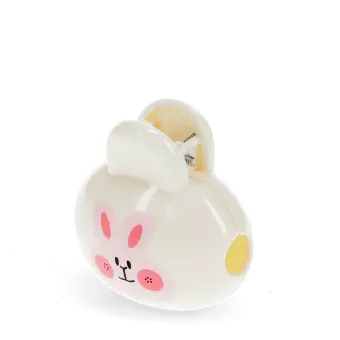 Bunny-themed travel toothbrush case with pink rabbit face 