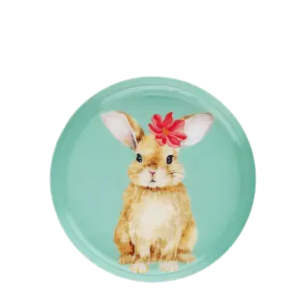 Round metal trinket tray featuring an illustrated rabbit with a red flower.