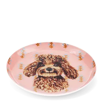 Round metal trinket tray featuring an illustrated brown dog with a decorative pattern.
