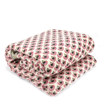 Hand block-printed throw with red floral pattern.
